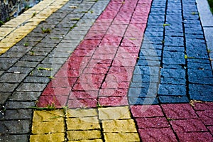 Colored paving slabs