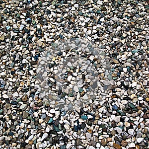 Colored pebbles texture background, decorative small stones texture