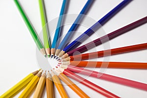 Colored pencils arranged in a semi circle