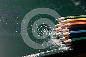 Colored Pencils on a Chalkboard