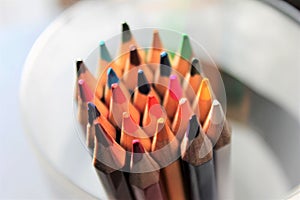 Colored pencils close up sharpened rainbow many choice