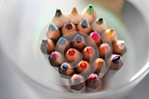 Colored pencils close up sharpened rainbow many choice