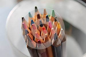 Colored pencils close up sharpened rainbow many choice