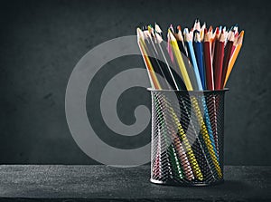 Colored pencils in a cup