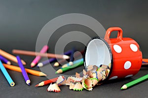 Colored pencils on dark background