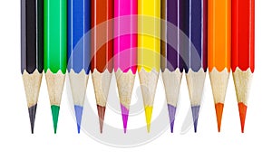 Colored pencils with facets, sharpened isolated on white background with clipping path