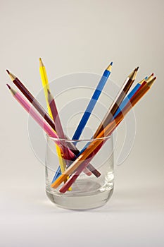 Colored pencils in a glass