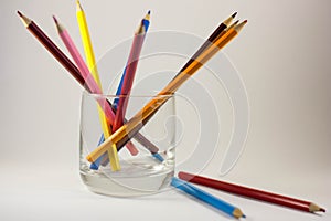 Colored pencils in a glass