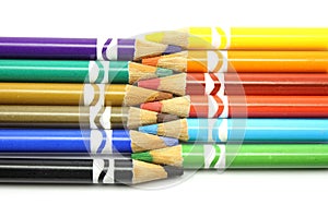 Colored pencils lined up together