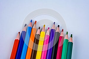 Colored pencils of rainbow colors .Many colored pencils