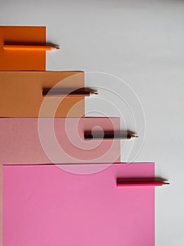 Colored pencils on strips of paper