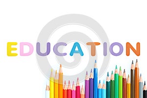 Colored pencils wave with alphabet sponge rubber of text `EDUCATION` over white background
