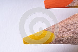 Colored Pencils on a white background, close up. macro