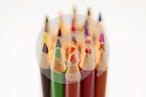 Colored pencils on white background