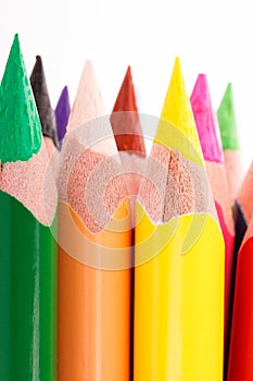 Colored pencils on white background