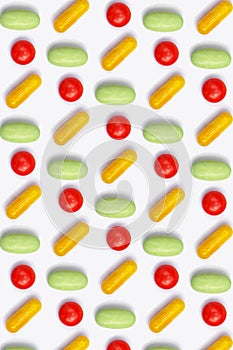 Colored pills arranged in row - pattern