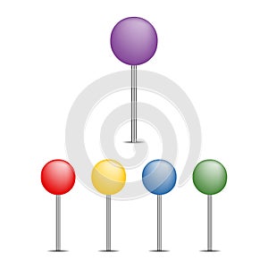 Colored pins an tacks on the white background