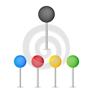 Colored pins an tacks on the white background