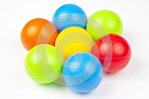 The Colored plastic balls on white background. leisure and game items. round objects