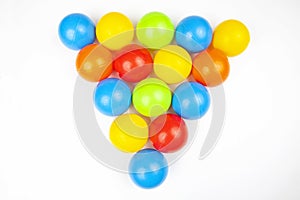 Colored plastic balls on white background. leisure and game items. round objects