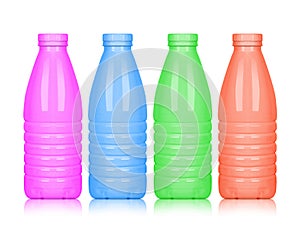 Colored plastic bottles isolated on white background