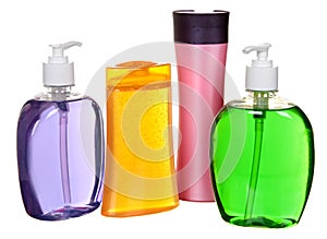 Colored plastic bottles with liquid soap and