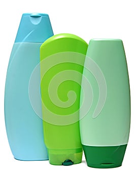 Colored plastic bottles with liquid soap and photo
