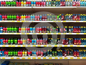 Colored plastic bottles for sales at Jumbo store