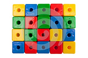 Colored plastic cubes on a white background