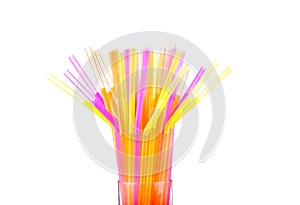 Colored plastic drinking straws on a white background