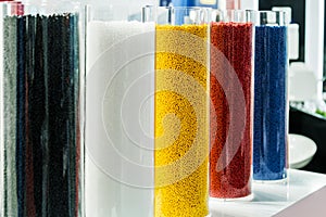 Colored plastic granules for the production photo