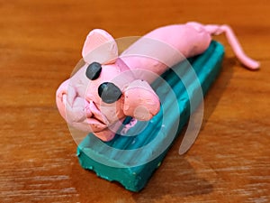 Colored plasticine sousage mouse photo
