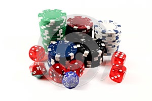 Colored poker chips and dices isolated