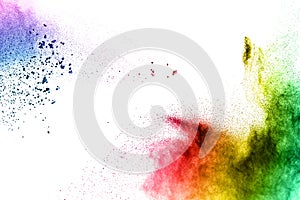 Colored powder splatted on white background photo