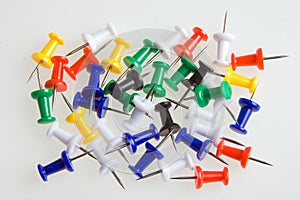 Colored push pin in different angles. Realistic attach button set.