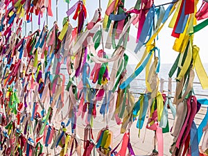 Colored Ribbons tied up on the fence from the seafront faleza cazinoului in Constanta, Romania