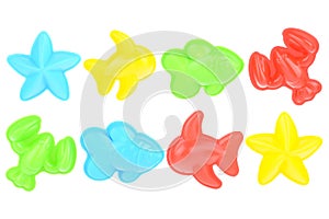 Colored sand molds isolated on a white background, close-up. Molds for playing in the sandbox. Build sand castles