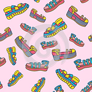 Colored seamless pattern of shoe prints. Vector illustration, design, doodle.