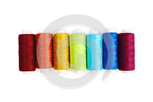 Colored sewing thread isolated on white background
