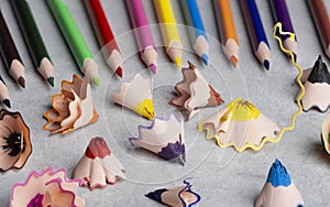 colored sharp pencils and colored pencil shavings.