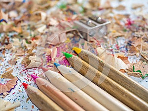 Colored sharpened crayons background school