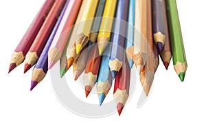 Colored sharpened pencils on a white background