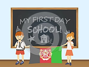 Colored smiling children, boy and girl, holding a national Afghanistan flag behind a school board illustration. Vector cartoon ill photo