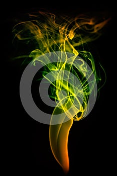 Colored smoke isolated on black