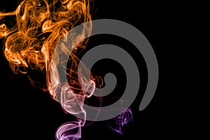 Colored smoke isolated on black background