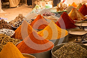 Colored spices on the market place in Morocco