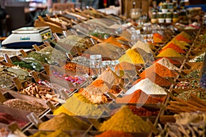Colored spices at the marketplace photo