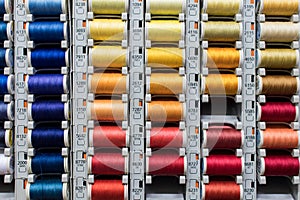 Colored spools of sewing thread