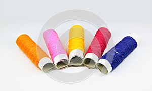 Colored spools of threads