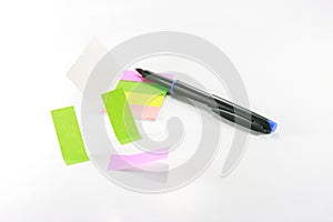 Colored sticky notes and pen